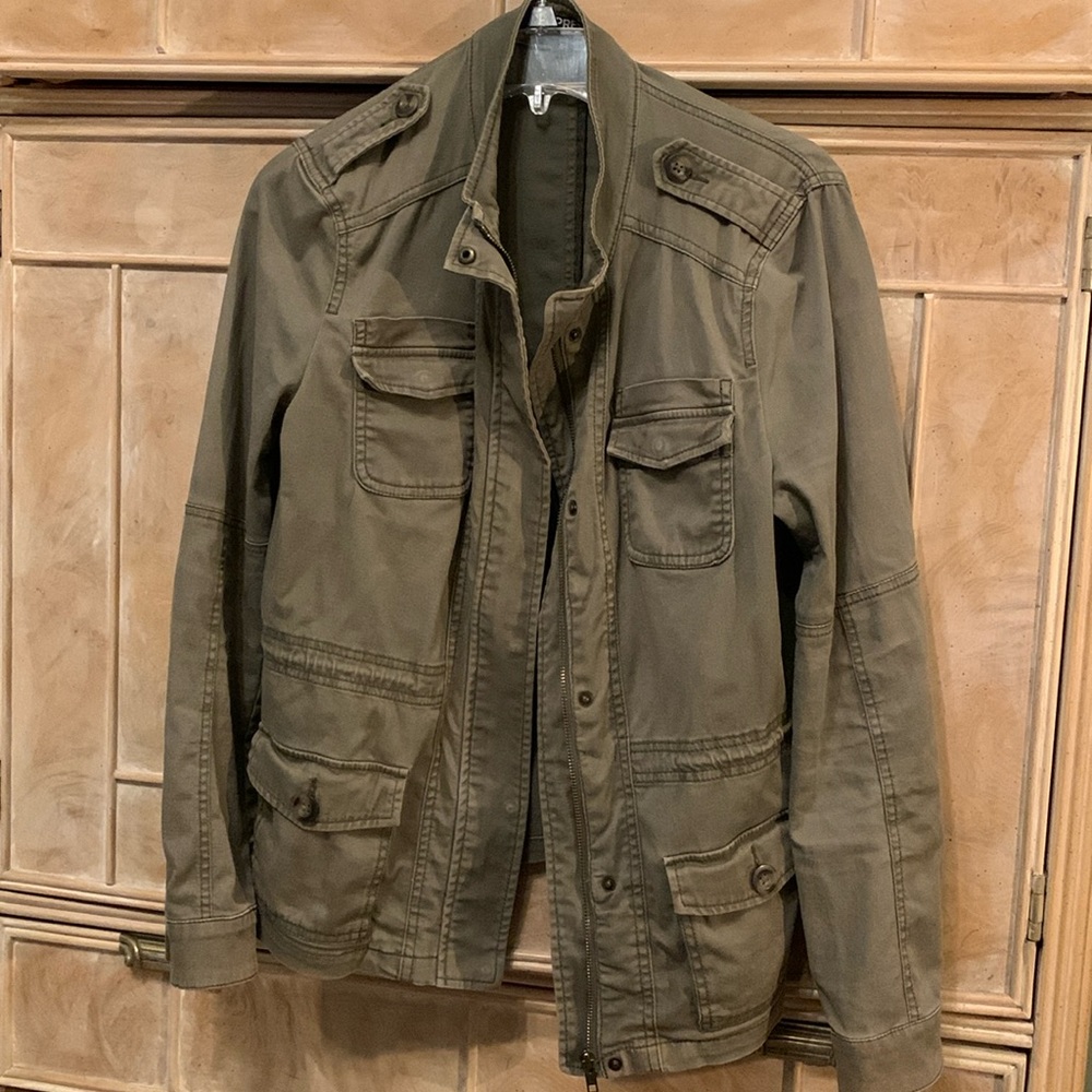 Olive green jacket, very stylish, smoke & pet free home